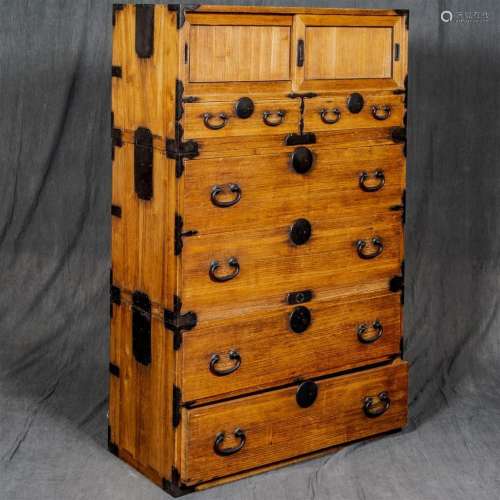 TANSU CHEST - Japanese keyaki, or zelkovia wood in three sections; the uppermost with sliding door over two half-width drawers, the...