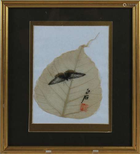 FRAMED WATERCOLOR OF A MOTH ON A BODHI LEAF - Mixed media; watercolor portrayal of a moth on a prepared bodhi leaf. Character signed...