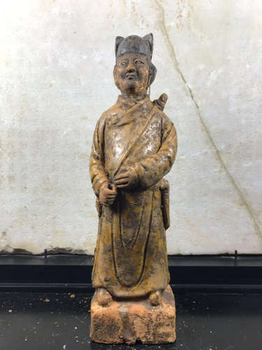 A SANCAI ARCHERY FIGURE