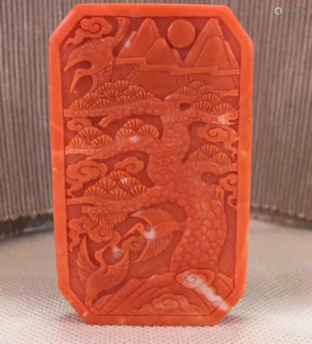 A MOMO CORAL CARVED PENDANT
