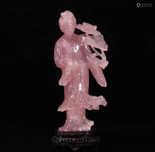 A PINK CRYSTAL CARVED LADY FIGURE
