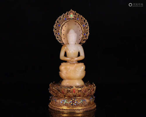 A GILT SILVER HETIAN JADE CARVED BUDDHA STATUE