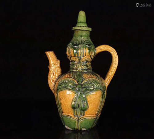 A SANCAI INCISED FLORAL PATTERN EWER