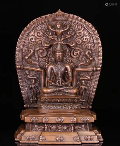 A BUDDHA STATUE WITH STAND