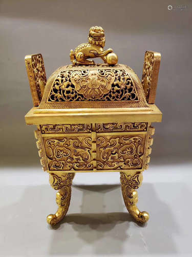 A GILT COPPER FOUR-FEET CENSER