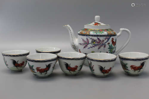 Chinese porcelain teapot and cups.