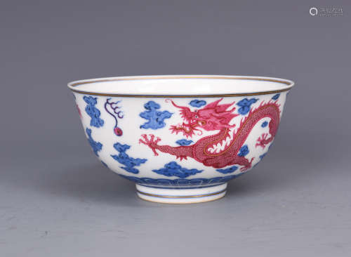 Chinese blue and white porcelain bowl with pink dragon