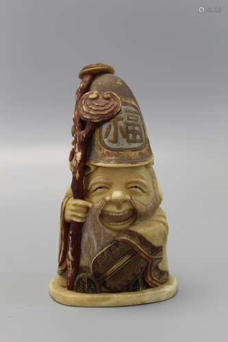 Japanese carved figurine of a Shoulao.