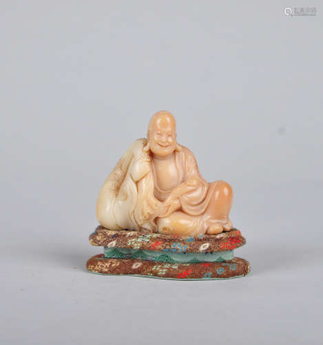 Chinese carved soapstone figure of a Luohan.