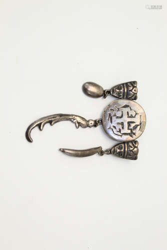 South American silver brooch