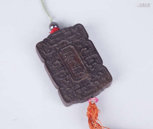 Chinese carved Chenxiang amulet.