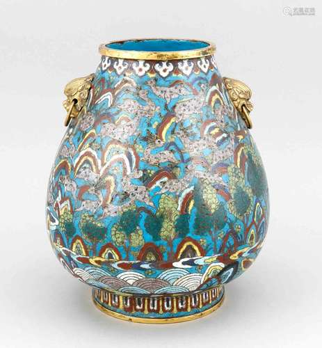 A Chinese Hu-form cloisonné vase around 1800, the side decorated with a continuous landscape with deer (''100 deer decor''), Ruyi-head boder on the neck end, borders and metal strips gilt, lion handles with rings, h. 28 cm