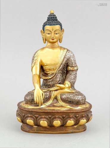 A 20th-century Buddha Padmasana on lotus base, China/Tibet, brass/copper/white metal, the face enriched in gilt, the bottom plate engraved, h. 23 cm