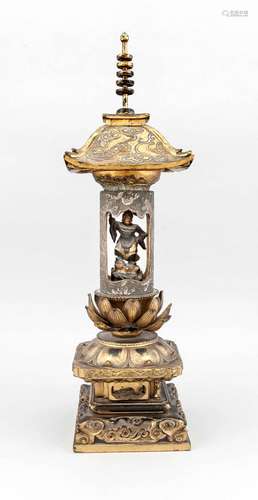 A Japanese home shrine, 18th/19th c., light Asian wood, polychromed and enriched in gilt, stepped lotus pedestal with cloud-bands in half-relief, pierced cravings (lacking one), gilt lotus leafs (some loosened, are enclosed), gilt pagoda roof with cloud-band relief, h. 55 cm