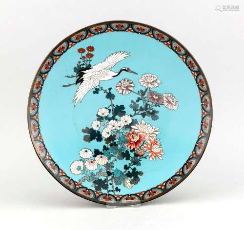 A 19th-century Chinese cloisonné plate, flowers and crane on blue-turquoise ground, the border underside with scale pattern, suspension, d. 30 cm
