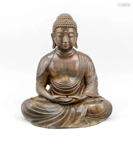 A tall seated Buddha Padmasana, China/Tibet, 20th c., patinated bronze, H. 37 cm