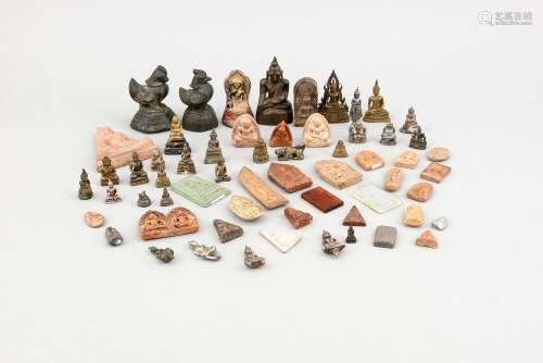 An assorted lot of ca. 57 miniature ceramics and metal Buddha figures as well as 3 opium wights (iron, 2 x bird, 1 x llama), ca. 0,5 - 10 cm