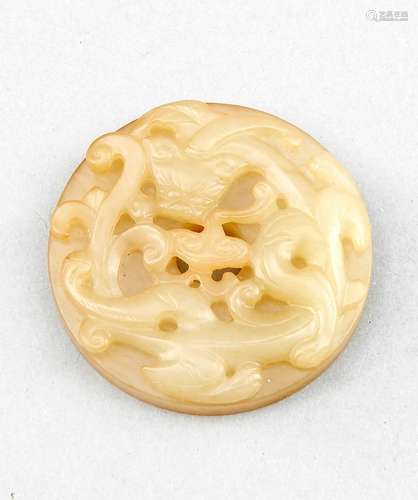 Bi-disc, China, probably 19th c., yellowish jade, d. 5.5 cm