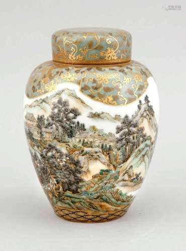 A 19th-century vase and lid with landscape decor, Japan/China, surrounding decor in green-blue shades heightened in gilt, the trompe-l´oeil decor of the lid simulates a bound drapery hanging over the shoulder, h. 20 cm