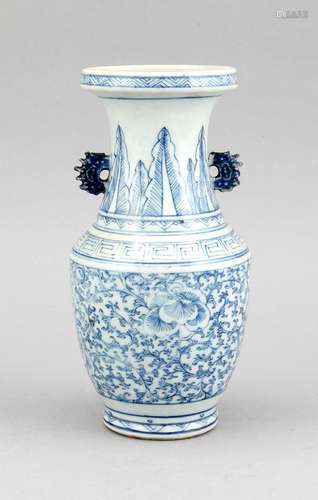 White-blue vase, China, probably 19th c., porcelain, open-worked handles (chiped), h. 23 cm