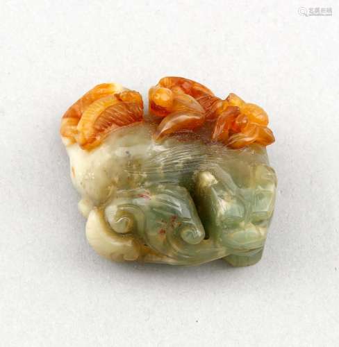 A small Chinese jade carving, 19th c.?, various insects on a dog, jade in seladon, light green and reddish-brown shades, pierced, ca. 5 x 5 cm