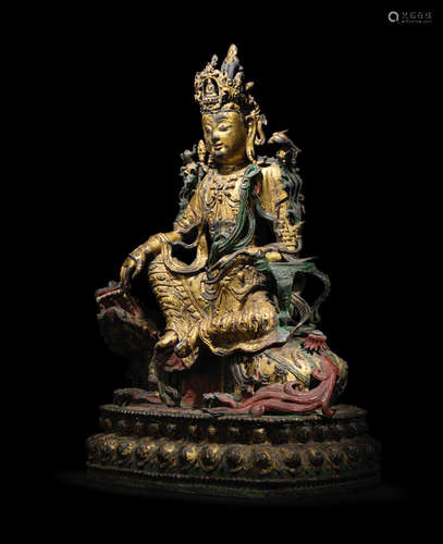 15th/16th century A rare and large parcel-gilt and painted bronze figure of Simhanada Avalokiteshvara