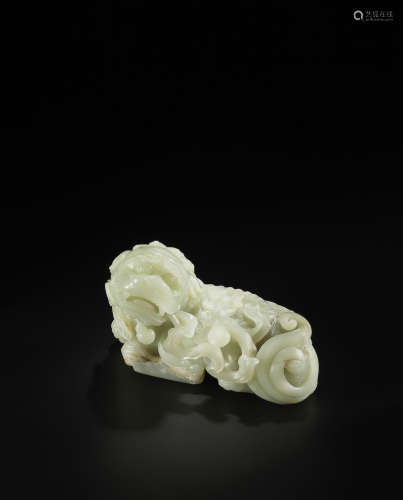 18th century  An extremely rare and large pale green jade carving of a Buddhist lion