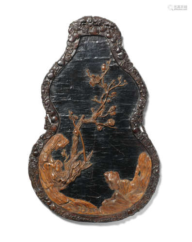 18th century A rare Imperial zitan and chenxiangmu lacquered 'double-gourd' panel
