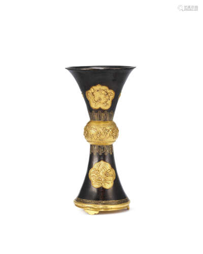 17th century An unusual parcel-gilt bronze beaker vase, gu