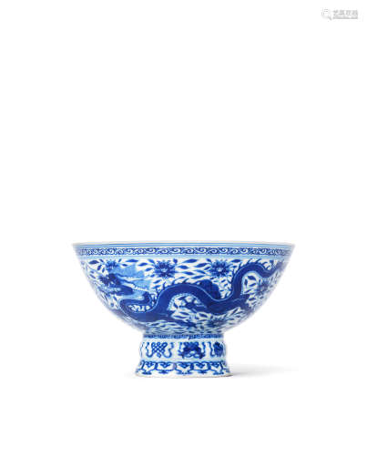 Yongzheng seal mark and of the period A rare blue and white 'dragons and lotus' stem bowl