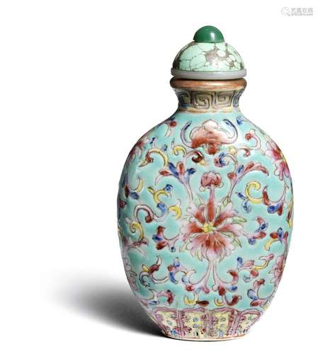 A Chinese porcelain snuff bottle, oval shaped decorated with flowers and scrolls on turquoise ground. Marked Daoguang 1820–1850. H.7.5 cm.