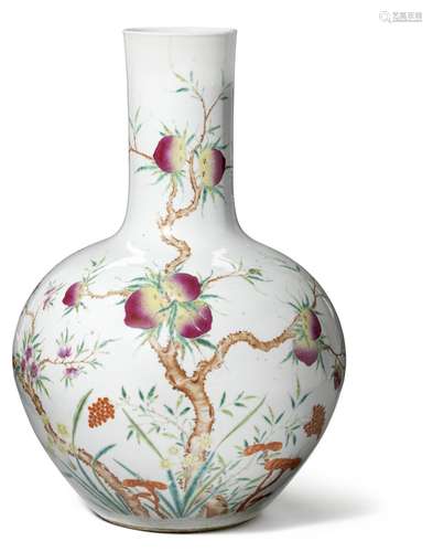 A “Nine Peaches” Chinese porcelain bottlevase decorated with the peaches, yellow flowers, lingzhi and bats. Marked Qianlong, but c. 1900. H. 60 cm. H. 60 cm.