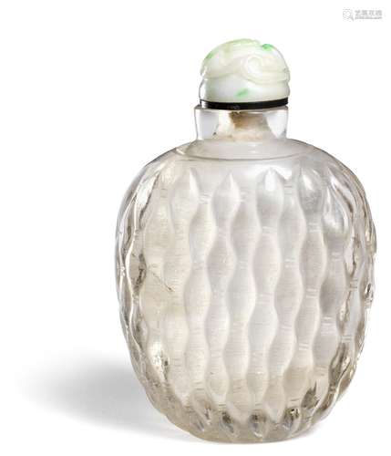 A Chinese rock crystal snuff bottle, the side decorated with basket-weave-pattern. Qing 19th century.  H. 7 cm.