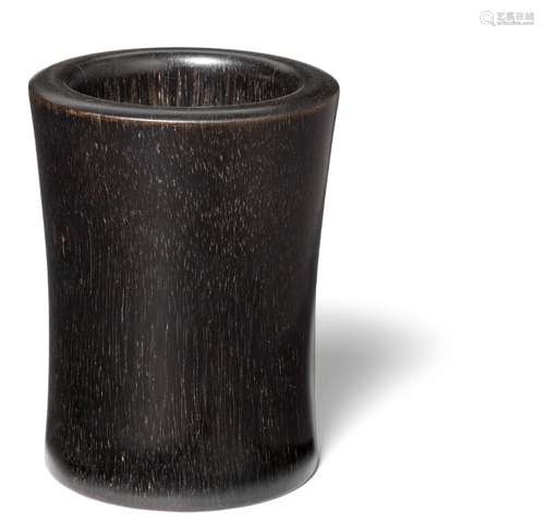 A Chinese zitan cylindrical brush pot, bitong. 20th century. H. 9 cm.