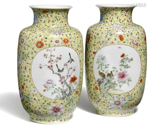 A pair of Chinese Hongxian porcelain vases decorated in colours with flowers and foliage. 20th century. H 27 cm. (2)