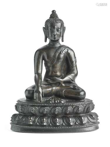 A Tibetan patinated bronze figure of Buddha Shakyamuni. 18th-19th century. Weight 335 g. H. 12.5 cm.