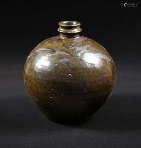 A northern Song dynasty Cizhou type ovoid jar, freely painted in sweeping strokes in russet slip