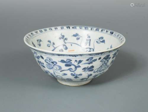 A Ming blue and white bowl, the interior decorated with a flower in the centre, a band of sanscrit