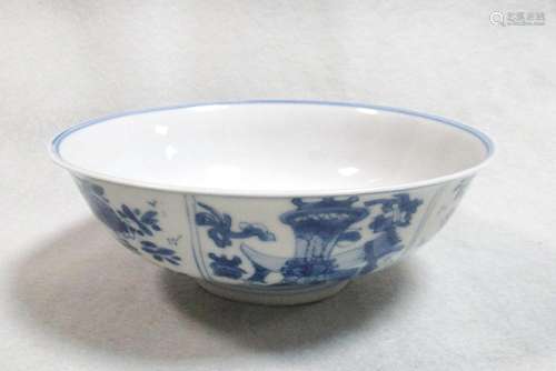 A Kangxi bowl, the exterior with alternating flower and precious object panels, 15cm diameter