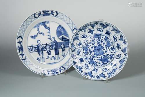 Two Kangxi dishes, one painted with two ladies and three children playing by a fence outside a