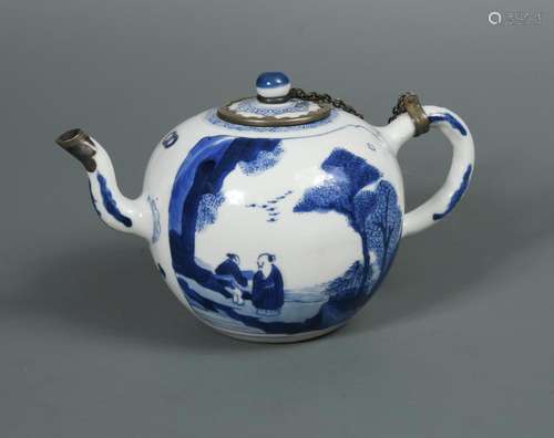 A Kangxi silver mounted blue and white tea pot and cover, the body painted with two rectangular