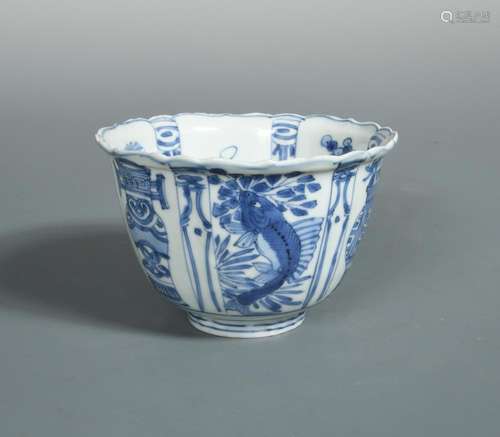 A transitional bowl, painted to the exterior with panels of alternating vases and fish, the interior