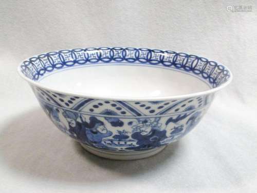 A Kangxi bowl with a dragon, the interior roundel enclosed by swastika centred cash medallions, 20cm