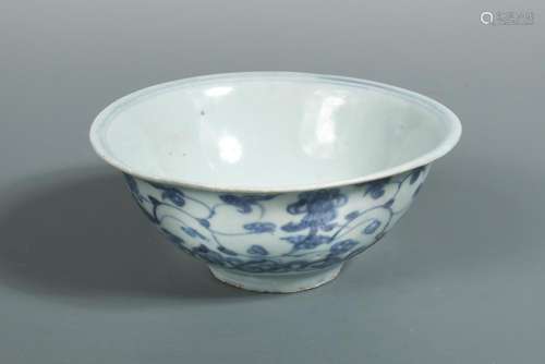 An early Ming blue and white bowl, the exterior painted with vine scrolling above ruyi lappets, 14.