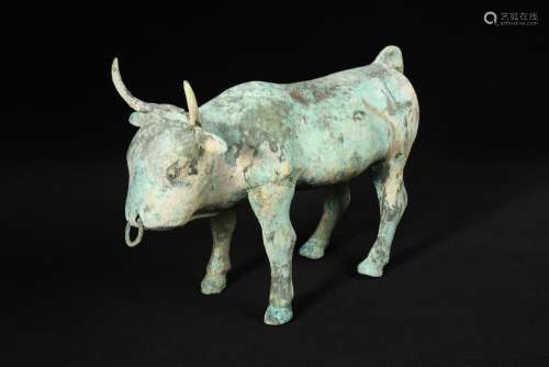 A Han dynasty bronze model of a buffalo, the muscular domesticated horned animal standing four