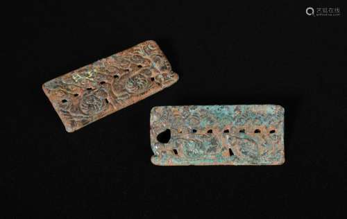A pair of bronze plaques, Northern China, 3rd to 2nd century B.C., decorated with a complex design