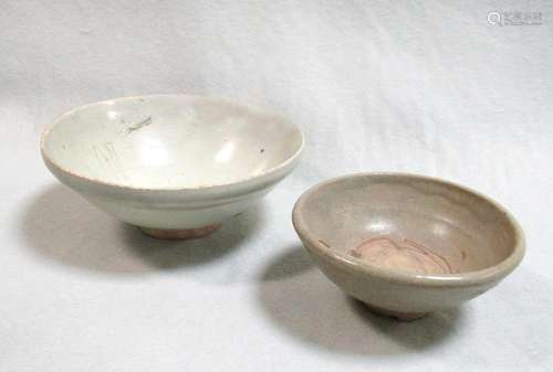 Two provincial Yuan dynasty bowls, one pale green-grey, 15.5cm diameter, the other a small bowl, the