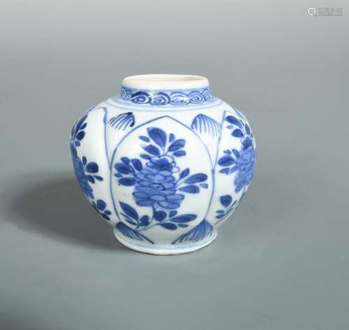 A Kangxi Jarlet with floral decoration, the leaf shaped moulded panels painted with flower stems,