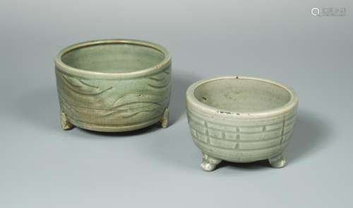 A late Yuan/early Ming Longquan celadon censer, of cylindrical form, with an inverted mouth rim, the