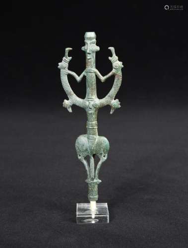 A Luristan bronze finial, circa 8th/7th century BC, in the form of the 'Master of the Animals'
